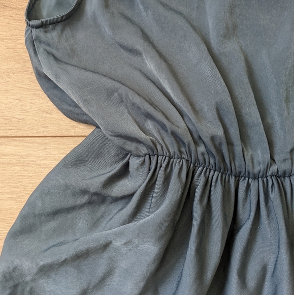 Asymmetrical, teal dress with waist cinching. - Picture 5 of 7